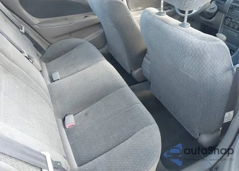 2001 Toyota Corolla Le из США, поврежденный, VIN 2T1BR12E21C470356